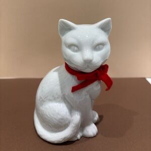 White Ceramic Cat Figurine with Red Bow